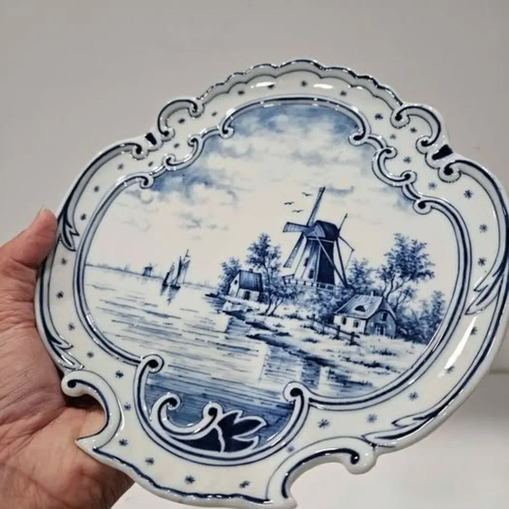Blue and white windmill decorative plate
